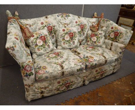 Early 20thC floral pattern Knole sofa on brass castors