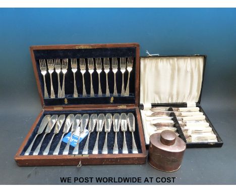 A plated fish service, another in oak case and a copper JS & SB tea caddy