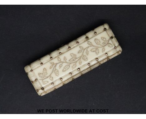 A 19thC gold inlaid carved ivory patch box with mirror, length 6.25cm