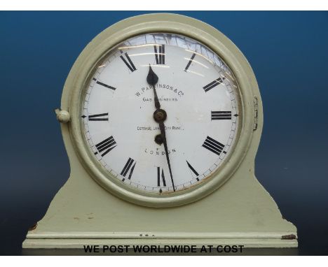 A metal cased eight day mantel style clock W Parkinson & Co. Gas Engineers, Cottage Lane, City Road, London' to painted dial 