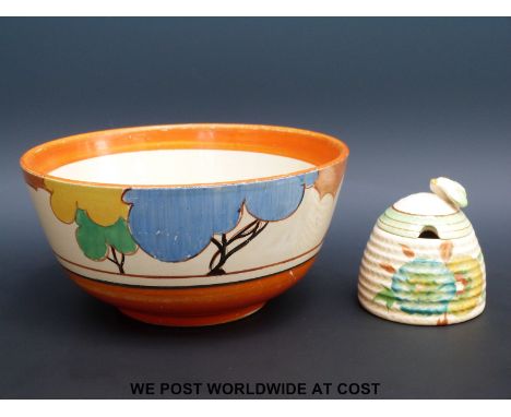 A Newport Pottery bowl, hand painted but not signed Clarice Cliff, together with an unmarked Clarice Cliff honey pot