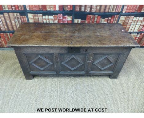 An 18thC oak three panel trunk 