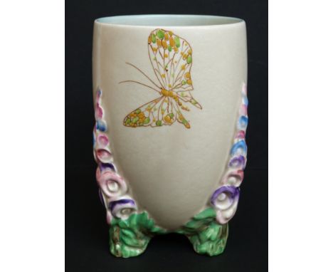 A Clarice Cliff 1930s vase with triple encrusted feet in the form of hollyhocks (16cm tall) 