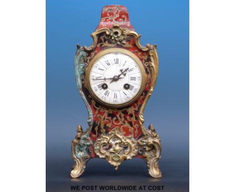 A Boulle clock with Roman and Arabic numerals and two train movement, 29cm tall
