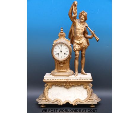 A figural ormolu/gilt metal and marble mantel clock featuring a hunter, the enamelled dial with Roman numerals and Breguet st