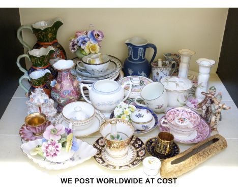 A collection of ceramics to include Masons graduated jugs, Limoges dressing table set, lustre cup and saucer, demitasse cups 