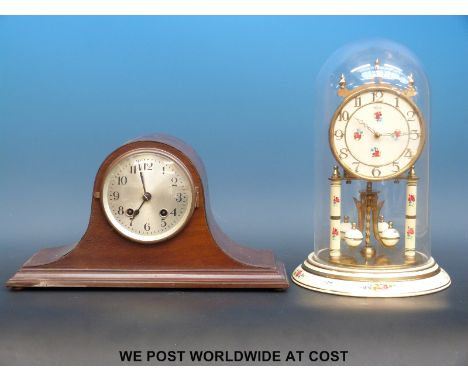 A mahogany cased Napoleon hat style mantel clock of small proportions, with silvered dial and Arabic numerals, together with 