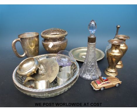 A quantity of plated ware etc, brass ware and a James Bond Aston Martin DB5 Corgi car, complete with figures