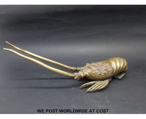 A bronze or similar model of a crayfish, length 22cm
