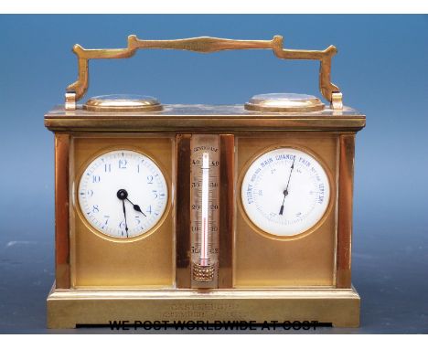 A French gilt carriage clock weather station compendium comprising timepiece, thermometer, barometer and compass with blue Ar