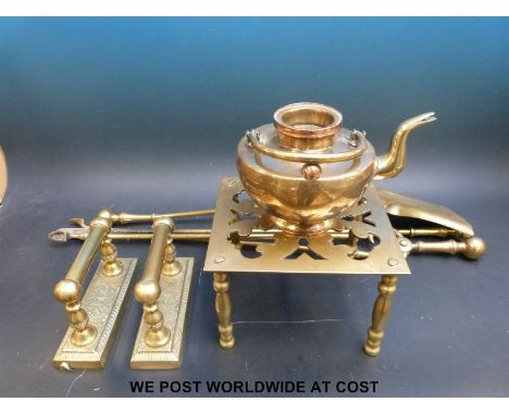 A three division oak umbrella stand, brass companion set, trivet, Arts & Crafts teapot etc