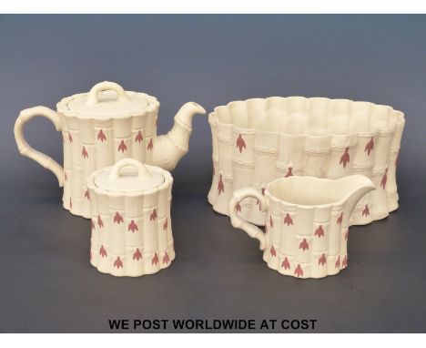 A Wedgwood Bambooware teapot, sugar and milk jug, together with a bowl