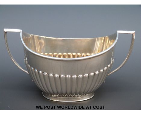 A Edward VII hallmarked silver twin handled sucrier, London 1903, Goldsmiths and Silversmiths & Co, width 16cm (160g)