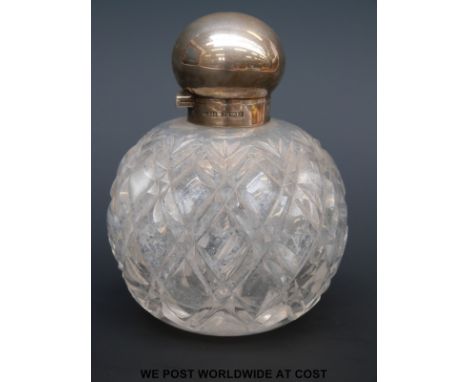 A Victorian hallmarked silver mounted hobnail cut globe shaped dressing table scent bottle, Birmingham 1900, maker John Grins