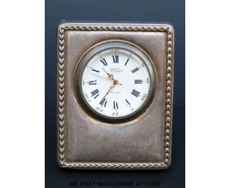 An R. Carr modern hallmarked silver travelling clock, height 6.5cm