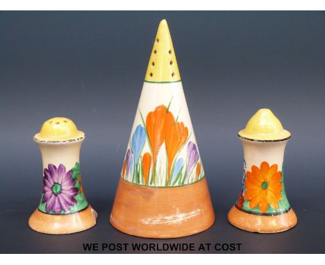 A Clarice Cliff Crocus sugar sifter together with a Gay Day salt and pepper pot (tallest 14cm)