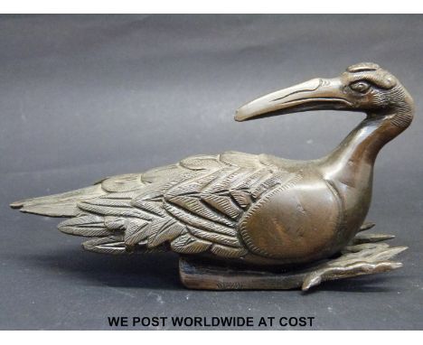 A bronze seated vulture probably Chinese length 14cm