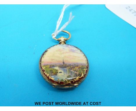 An 18ct gold fob watch case decorated in enamel depicting a river scene (13g)