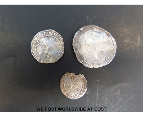 An Elizabeth I hammered sixpence together with a 1566 threepence and a 1561 penny. Faint portraits on 6d and 3d and good port