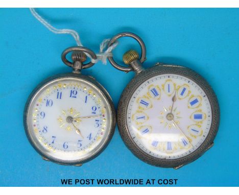 Two Continental white ladies fob watches both with ornately engraved cases marked 935 and gilt highlighting to the white enam