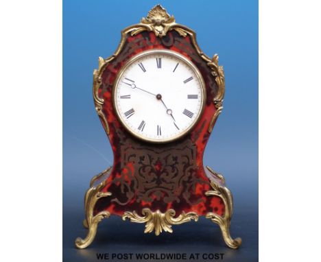 A gilt metal mounted Boulle tortoiseshell and brass mantel clock with single train movement stamped Brevete, 24cm tall