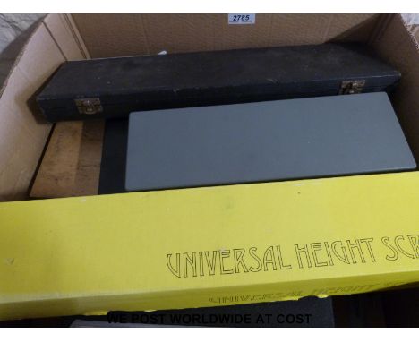 A quantity of engineering tools to include vernier calipers, planimeter, angle measurers, Maco adjustable template 