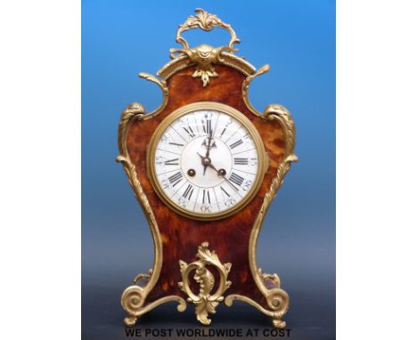 An French tortoiseshell gilt-mounted bracket or mantel clock with two-train movement striking on a gong, 41cm tall