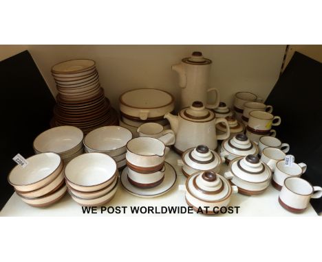 A large collection of Denby Potter's Wheel dinner and tea ware include tureen, a large and medium serving bowl, covered soup 