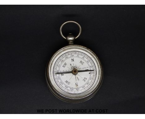 A novelty vesta formed as a compass, marked Moko to the dial, height 7cm