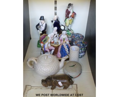 A collection of ceramics including a Belleek teapot, Staffordshire figures, a chess playing figural group and Oriental cerami