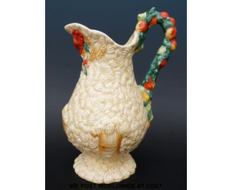 A Clarice Cliff Harvest pattern jug (23cm tall)