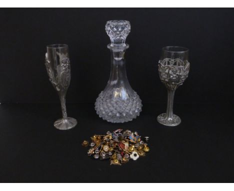 Two Lord of the Rings pewter and glass goblets dated 1996-99, a glass decanter and a box of enamel badges