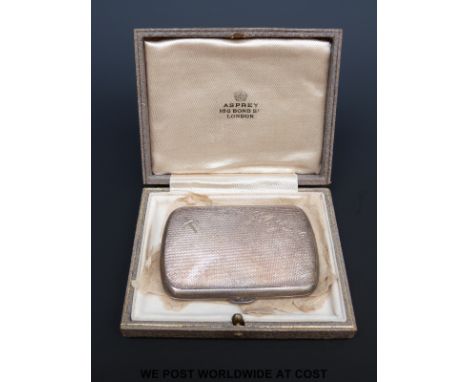 A cased Asprey hallmarked silver compact, engraved with the signature 'C. de Gaulle' and the Cross of Lorraine, symbol of the