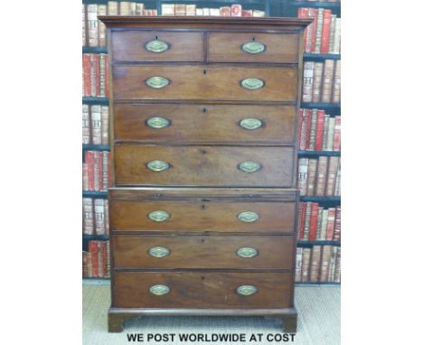 A Georgian mahogany chest on chest, the top section fitted with two over three graduated drawers, the base fitted with brushi