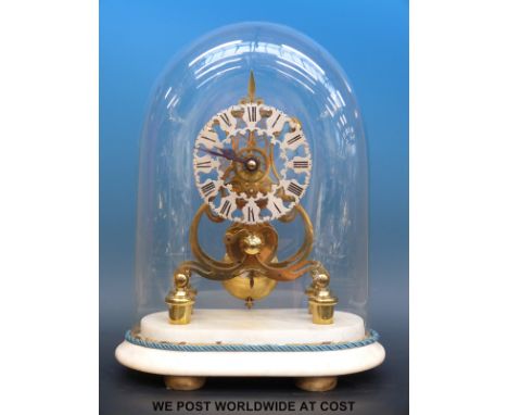 A 19thC brass skeleton clock under glass dome, the fusee movement having silvered and pierced chapter ring, height including 