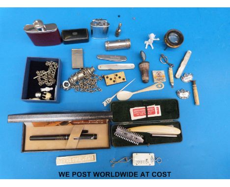 A quantity of items to include whistle, lighter, hip flask, vesta case, seal, whiskey and gin labels, ivory needle box etc 