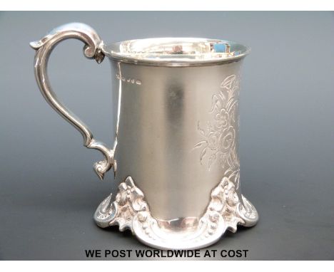 A Victorian hallmarked silver christening mug with ornate decoration to base, Sheffield 1861 maker Henry Wilkinson & Co., hei