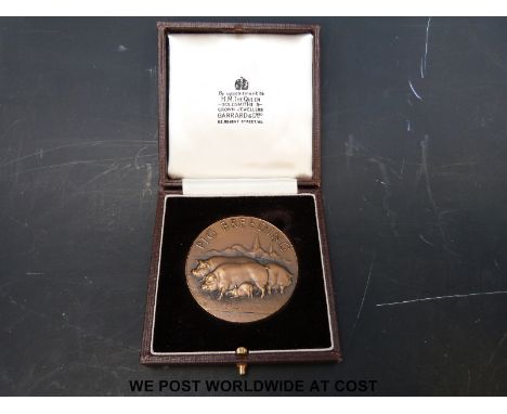 A pig breeding medal presented to Mr A.C. Lawrence 1966-1969 by BOCM in Garrard & Co. case