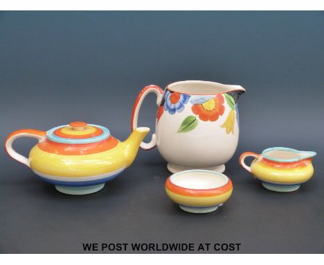 A Susie Cooper Gray's Pottery, hand painted jug together with a Susie Cooper, Gray's Pottery teapot, sugar bowl and milk jug
