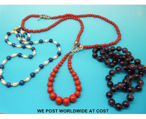 A beaded amethyst necklace, an alternating pearl and lapis lazuli necklace and an Art Deco style necklace 