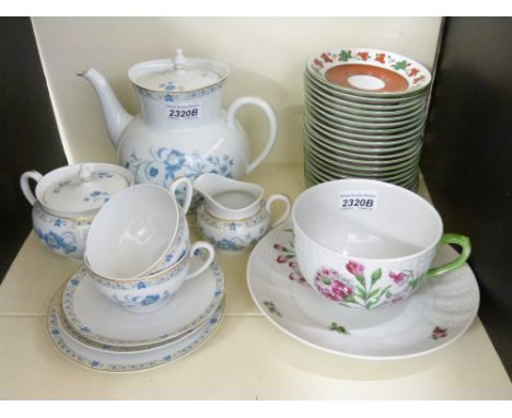 A part Limoges tea service, Herend and German saucers