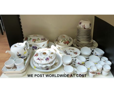 A large collection of Royal Worcester Evesham Gold dinner and tea ware to include lasagne and asparagus dishes, a saucepan, r