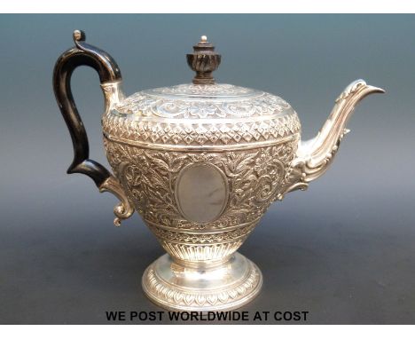 A William IV or Victorian hallmarked silver teapot with embossed decoration, height 18cm, London 1837 maker Edward, Edward Ju