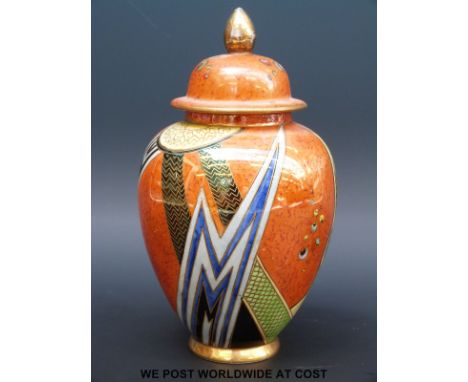 A Carltonware Jazz pattern lidded vase with abstract design on mottled ground stamped Carlton Ware to base (17cm tall)