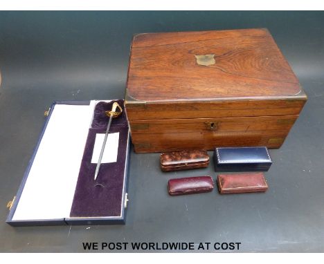 A 19thC brass bound writing slope with fitted interior, Wilkinson Sword letter opener and three vintage jewellery boxes