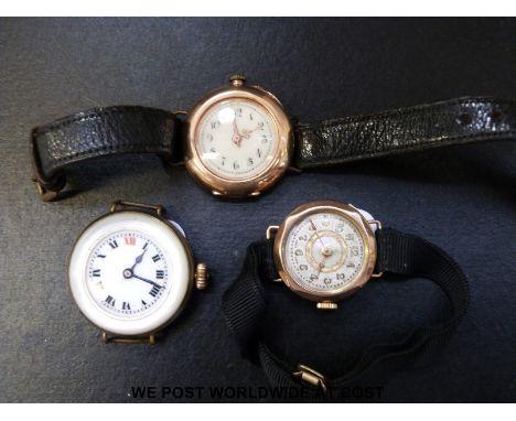 A 14ct gold ladies wristwatch with an enamel face, a 9ct gold ladies wristwatch and one other with mother of pearl bezel. 