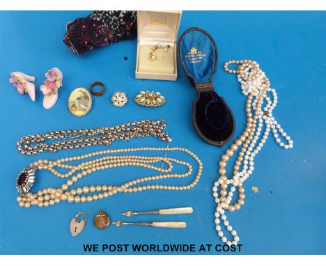 A collection of jewellery to include faux pearls, two hallmarked silver and mother of pearl dressing table items, 9ct gold ea