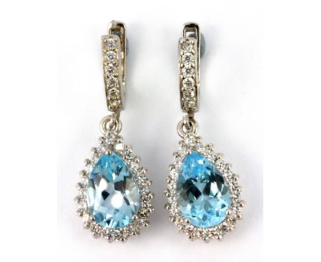 A pair of 925 silver drop earrings set with pearl cut Swiss blue topaz surrounded by cubic zirconia, L. 2.6cm. Condition : ve