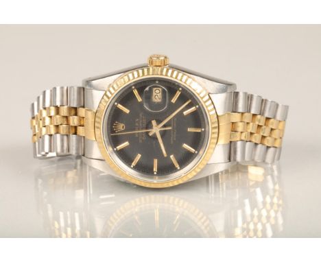 Rolex Oyster Perpetual Datejust automatic wristwatch chronometer, the black enamel dial with gold coloured baton hands, five-