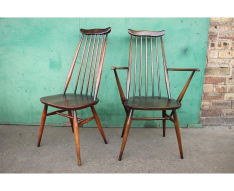 Six Ercol Goldsmith windsor dining chairs with eight matching elbow chairs. 